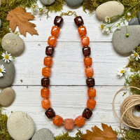 Collier Cube orange léopard