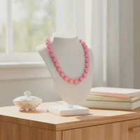 Collier Cube rose bonbon